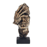 Tišina je zlato statue