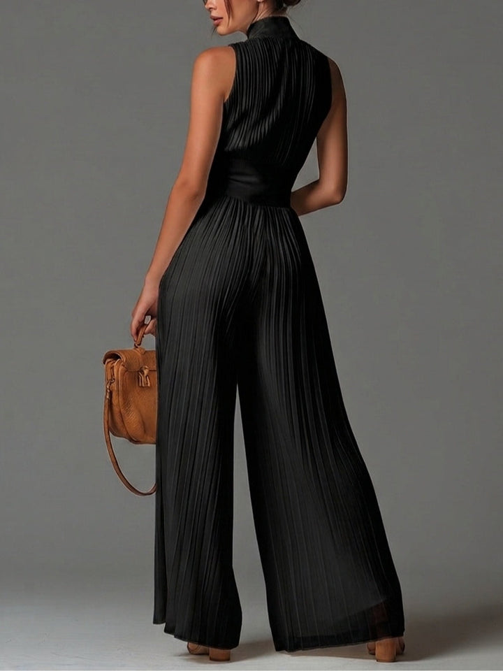 Tutina in chiffon senza maniche con scollo a V, zip e pantaloni a gamba larga